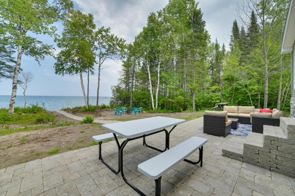 Cheboygan Getaway with Fire Pit and Lake Access!